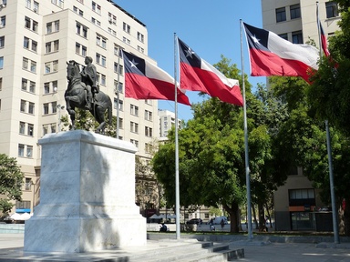 A monument and flags in Santiago, Chile