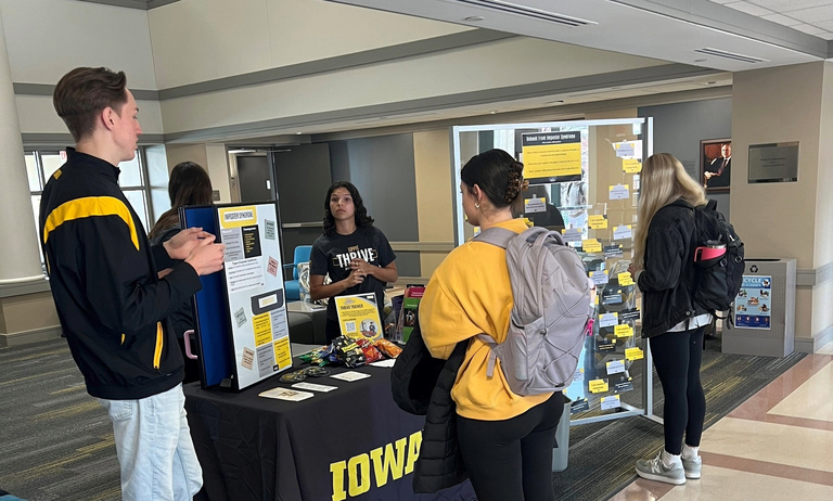 Students working emotional health table.