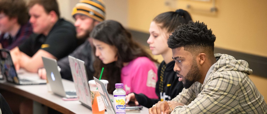 Students in a Tippie classroom