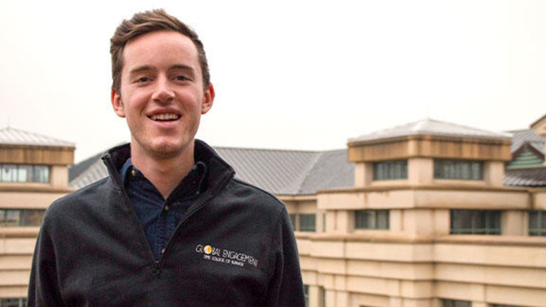 Tippie student on the roof of the Pappajohn Building